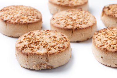 Traditional Spanish mantecados dessert or Christmas shortbread cookies isolated on white background