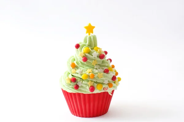 Cupcake with Christmas tree shape on wood — Stock Photo, Image