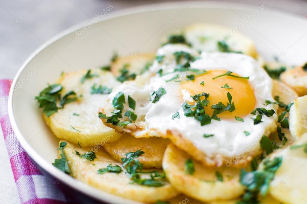 Potatoes and fried eggs