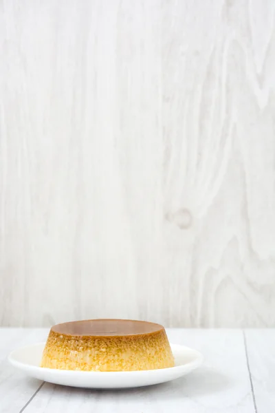 Langosta de caramelo sobre madera blanca — Foto de Stock