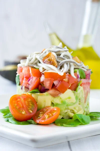 Vegetables and baby eels or elvers tartare — Stock Photo, Image