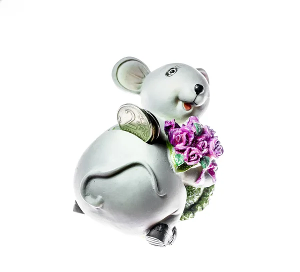 Piggy in the form of a mouse with the inserted coins — Stock Photo, Image