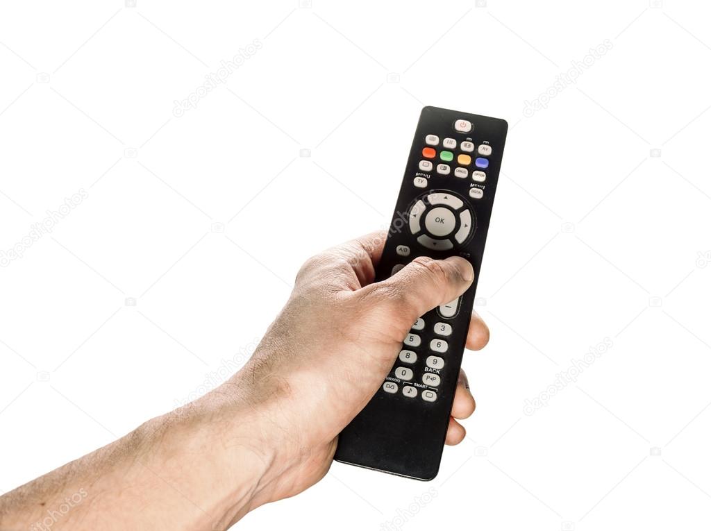 The TV remote control in hand isolated on white background