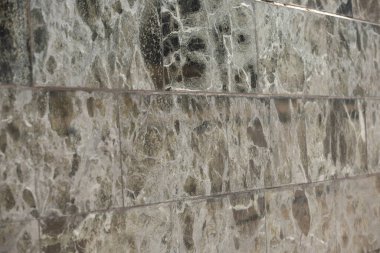 Mermer desenli. Mermer fayanslara yakın çekim. Siyah mermer desenli doku arka planı. Tasarım için mermer.