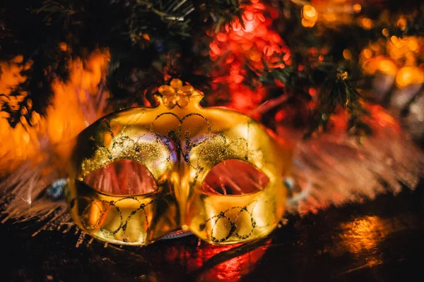 Christmas. Carnival mask near the Christmas tree. mask near new year tree.