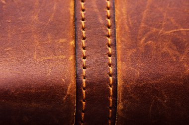 Kahverengi kumaş dokusu. Kahverengi kumaş. Tasarımcılar için malzeme kahverengi deri arka plan. Deri