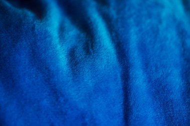 Mavi kumaş dokusu. Mavi kumaş. Tasarımcılar için malzeme mavi kumaş arkaplan