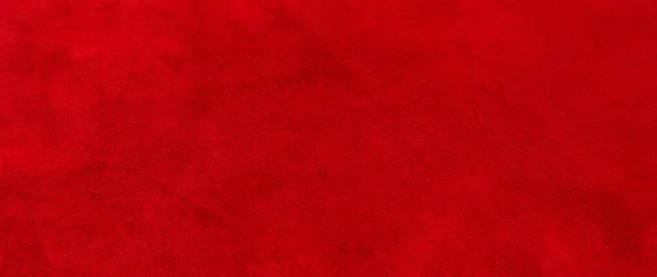 スエード生地の赤いマットの背景 クローズアップ シームレス革のベルベットの質感 フェルト素材 — ストック写真