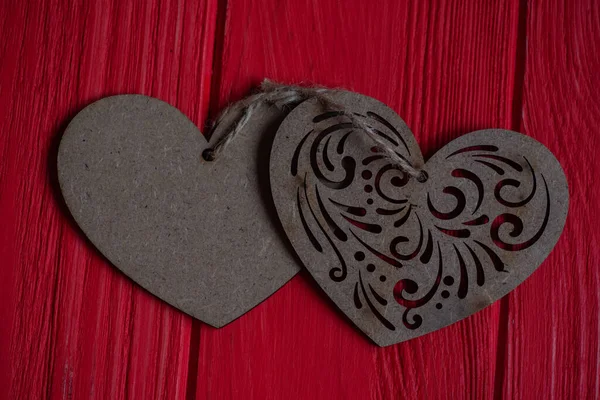 Red Painted Wood and plywood heart. painted old wooden wall. red background, red plank background