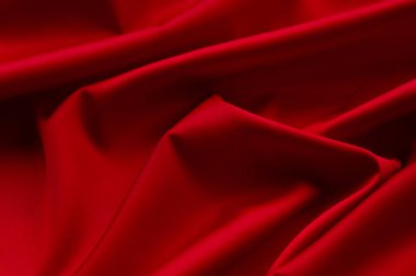 Kırmızı ipek kumaş. Bu saten kumaş kumaş kumaş kumaş dokusu, arka plan ve desen yapmak için mükemmel. Kırmızı