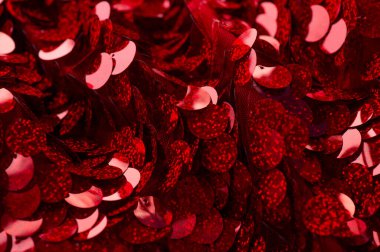 Pırıl pırıl pullar. Arka plan için kırmızı pullu kumaş. dikdörtgen kırmızı parlak kumaş, Noel