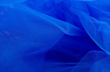 Arkaplan olarak kullanılan açık mavi doku. Mavi açık renk kumaş dokusu. Yakın çekim mavi sentetik kürk dokusu