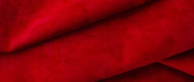 Pürüzsüz deri kadife desenli. Keçeleşmiş makro. Kırmızı süet kumaş. Kumaş, deri