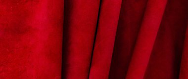 Pürüzsüz deri kadife desenli. Keçeleşmiş makro. Kırmızı süet kumaş. Kumaş, deri