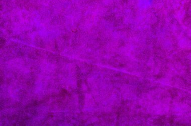 Pürüzsüz deri kadife desenli. Keçeleşmiş makro. Süet kumaş, mor deri.