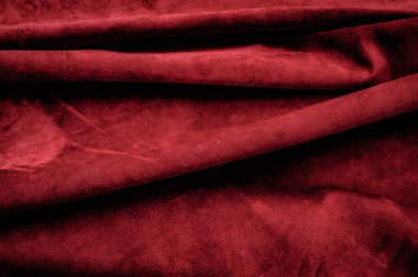 Pürüzsüz deri kadife desenli. Keçeleşmiş makro. Kırmızı süet kumaş. Kumaş, deri