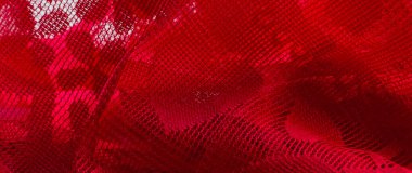 Lüks bir kırmızı ağ kumaşı, arka planda kullanışlı. Kalplerdeki kırmızı kumaş örgüsü.