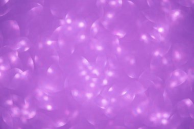 Defocus lights purple color. Glitter defocus as background