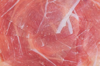 Arka plan olarak ince dilimlenmiş et makro fotoğraf