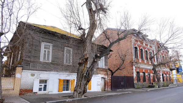 Astrakhan, Russia, January 10, 2021. Old buildings of the city. Facade. Embankment 1 May street.