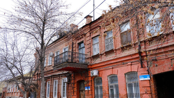 Astrakhan, Russia, January 9, 2021. Old buildings of the city. Facade. Chekhov street