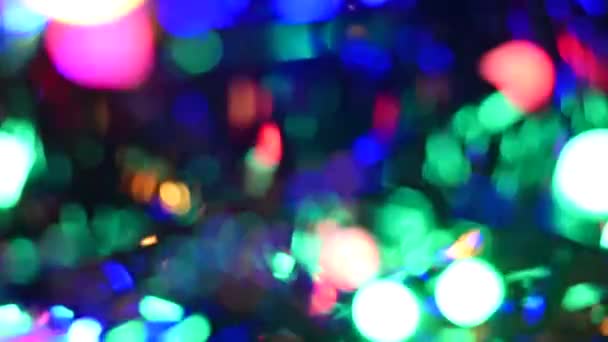 Χριστούγεννα αφηρημένη φόντο defocused bokeh πολύχρωμο θολή όμορφο λαμπερό φωτίζουν coleidoscope — Αρχείο Βίντεο