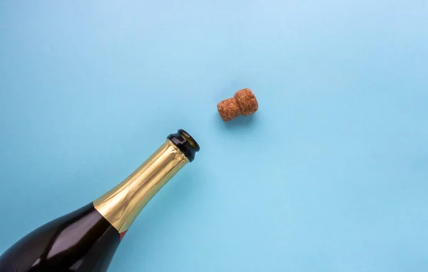 Open Bottle Champagne Cork Blue Background Holiday Concept New Year — Stock Photo, Image