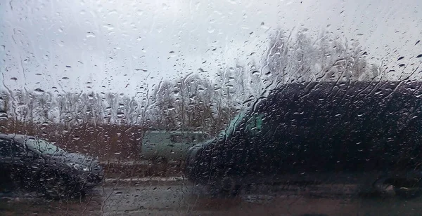 Gotas Lluvia Cristal Ventana Fondo Ciudad Lluviosa — Foto de Stock