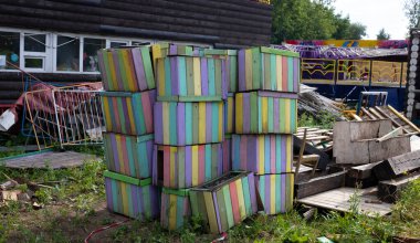 Colorful wooden boxes in the backyard in the park.