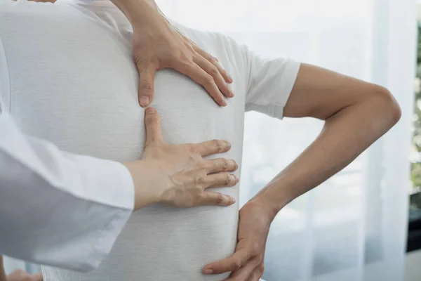 Female Physiotherapists Provide Physical Assistance Male Patients Back Injuries Back — Stock Photo, Image