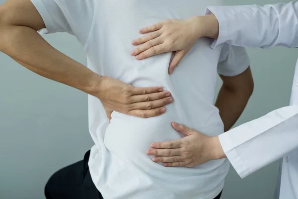 Female Physiotherapists Provide Physical Assistance Male Patients Back Injuries Back — Stock Photo, Image