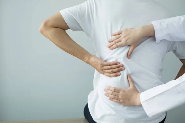 Female Physiotherapists Provide Physical Assistance Male Patients Back Injuries Back — Stock Photo, Image