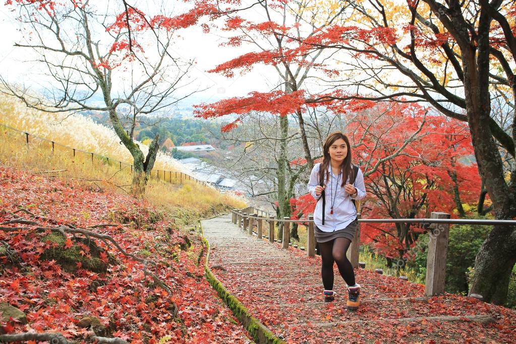 girl travel in autumn season