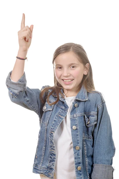 Portrait d'une écolière levant le doigt, sur blanc — Photo