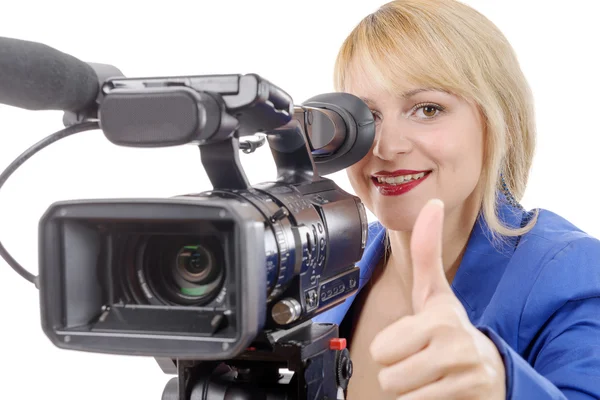 Bela jovem com uma câmera de vídeo profissional e cabeça — Fotografia de Stock