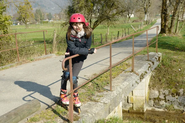 Nedospělý v kolečkové brusle — Stock fotografie