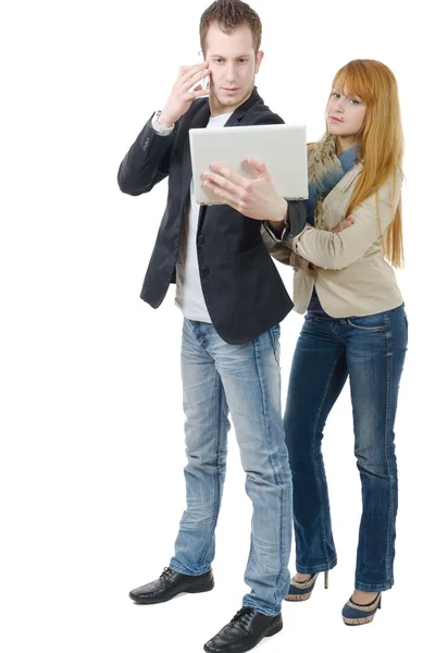 Two business people working together with a laptop — Stock Photo, Image