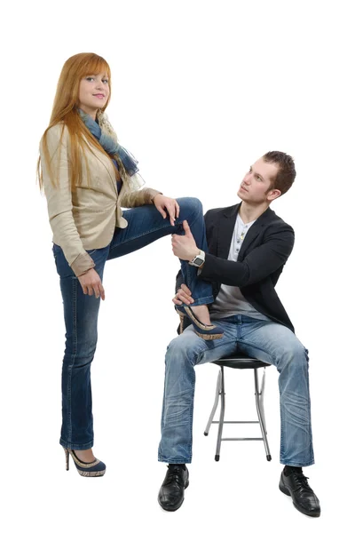 Young woman sets foot on her lover — Stock Photo, Image