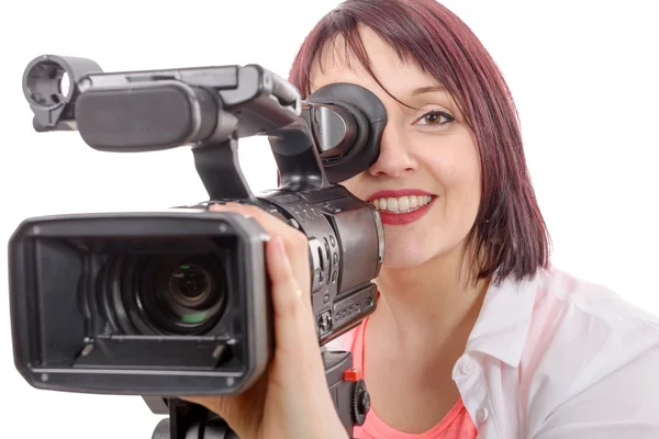 Симпатичная молодая женщина с профессиональной камерой — стоковое фото
