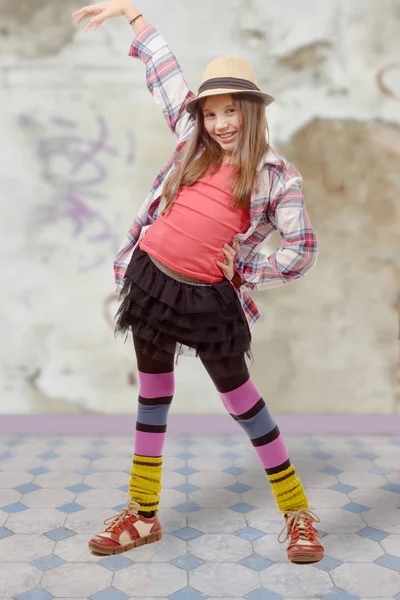 Young girl in hipster style with hat — Stock Photo, Image