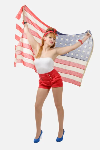 Mladá žena s americkou vlajkou — Stock fotografie