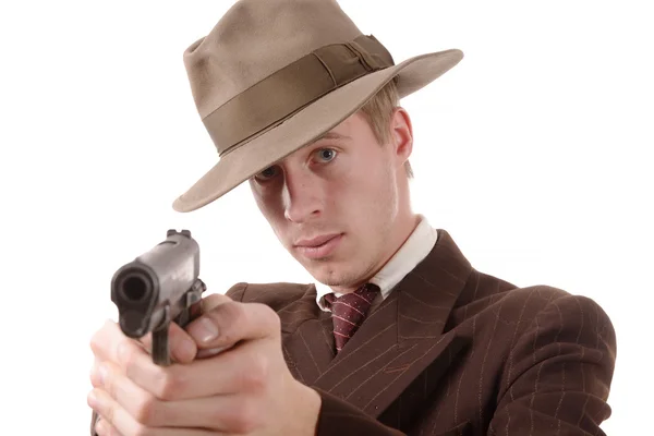 Gangster in a suit vintage, aim with a gun — Stock Photo, Image