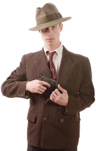 Гангстер в винтажном костюме, с пистолетом — стоковое фото