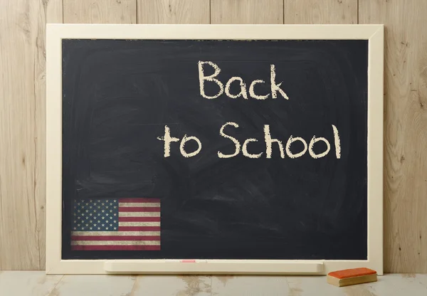 Back to school written on blackboard — Stock Photo, Image