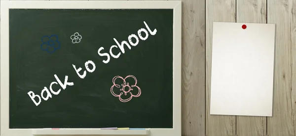 Back to school written on green blackboard — Stock Photo, Image