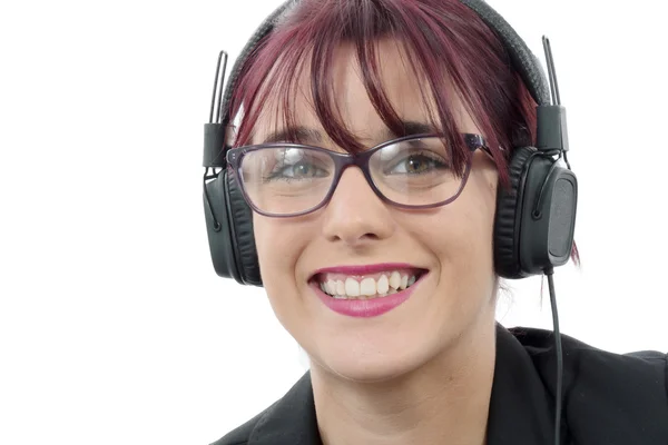 Retrato de una hermosa joven con auriculares —  Fotos de Stock