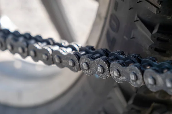 a close-up of motorcycle chain
