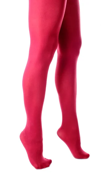 Женские ноги с цветными колготками — стоковое фото
