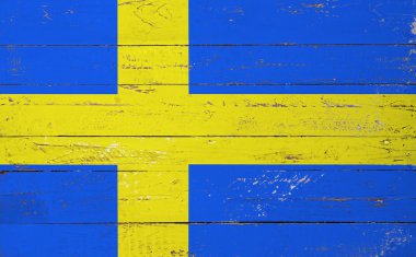 Finlandiya bayrağını bir ahşap tahta üzerine boyalı