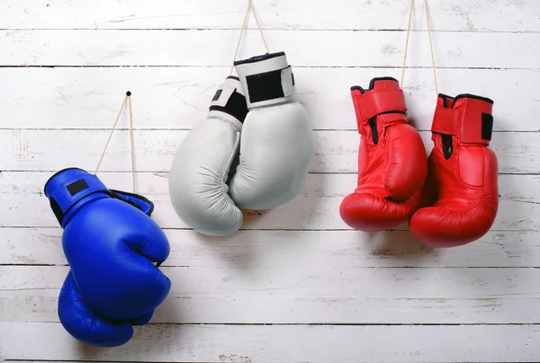 Boxing gloves blue, white and red wall hung — Stock Photo, Image